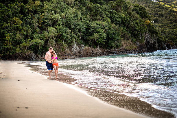 istock Couple Walking on the Beach 538142823