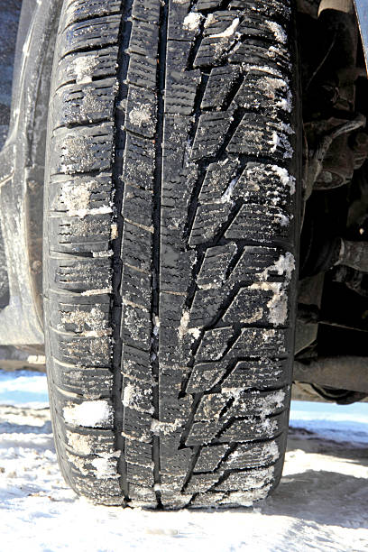 istock Car tire in the winter way 538148337