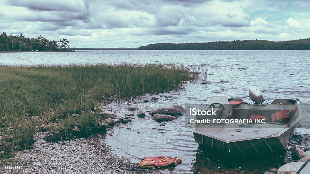 Beautiful Nova Scotia Landscape with ranger's boat in Sunset, in Kejimkujik National Park, Nova Scotia in Canada. 2015 Stock Photo