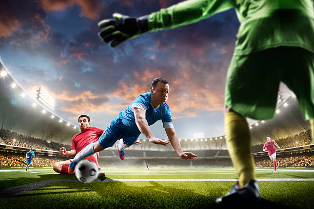 istock Soccer players in action on sunset stadium background panorama 538151622