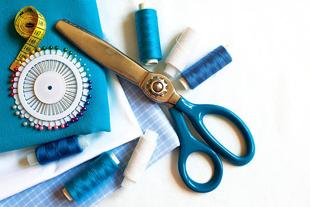 istock Sewing background with color threads, meter, pins and scissors 538152424