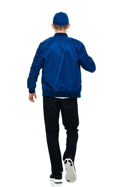 istock Rear view of male walking 538152698
