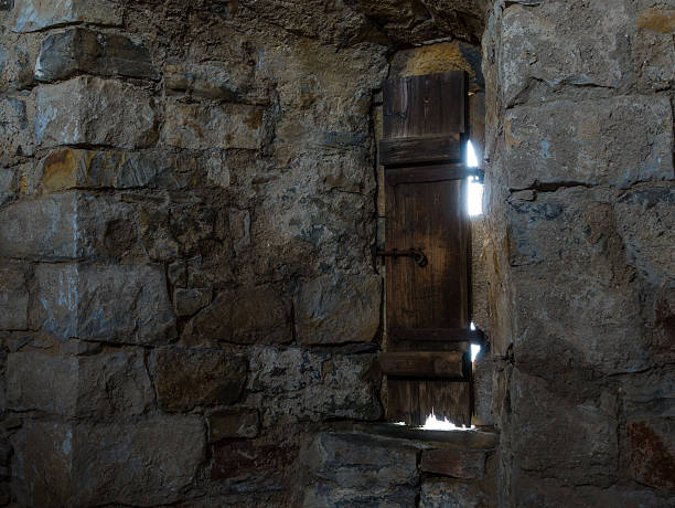 istock Dark room with stone walls and window 538156210