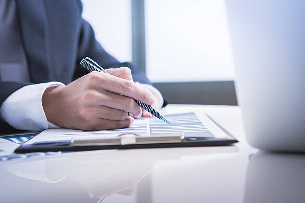 istock Business adviser analyzing financial figures denoting the progre 538157162