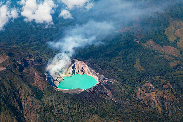 Kelimutu, Three multicolored cratered acid lakes that periodically change their color - Flores Island, Indonesia.