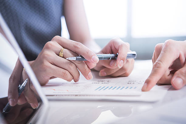 istock Image of business partners discussing documents and ideas at mee 538159434