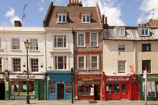 Rye, England - June 13, 2023: High St, Rye, Sussex, England. Tourists walk on High St.