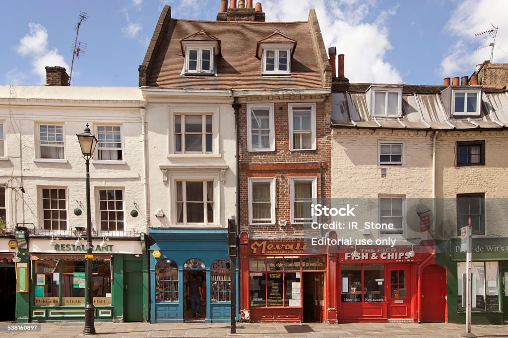 Old street Greenwich view with small shops, London London, UK - June 11, 2014: Old street Greenwich view with small shops Store Stock Photo