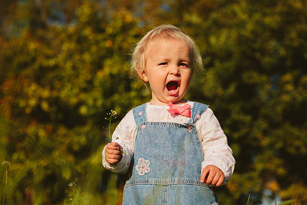 istock baby tasting the plant 538163345