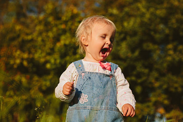 istock baby tasting the plant 538163347