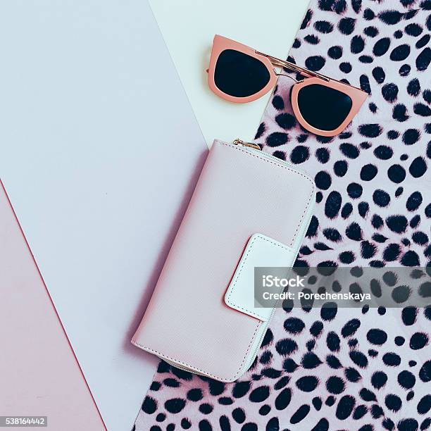 Ladies Fashion Accessories Pink Clutch And Sunglasses Pastel C Stock Photo - Download Image Now