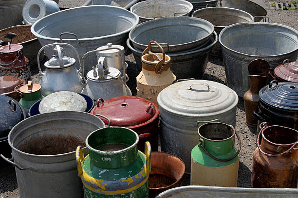 Flea market churns Collection of old crapped flea market churns butter churn stock pictures, royalty-free photos & images