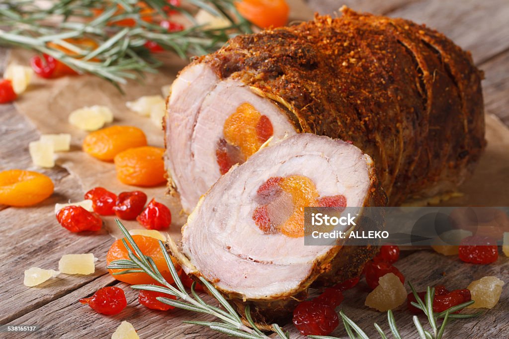 Pork meat with dried apricots, cherries and pineapple Pork meat with dried apricots, cherries and pineapple closeup. horizontal Apricot Stock Photo