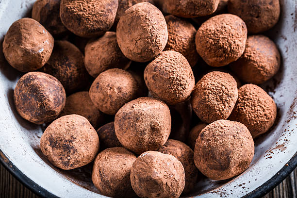 istock Closeup of chocolate balls in a white bowl 538165517