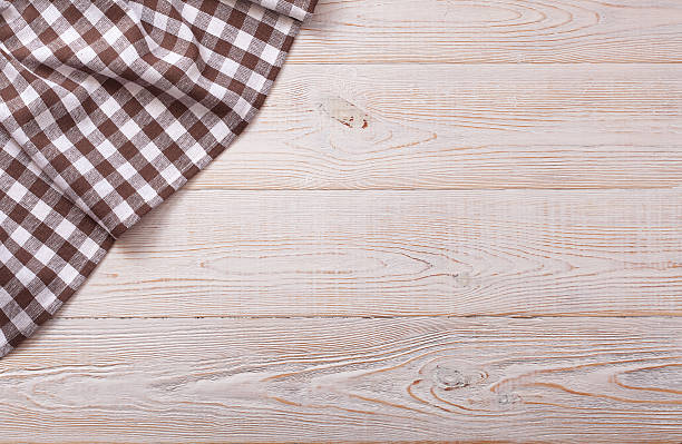 istock Top view of checkered tablecloth on white wooden table 538166691