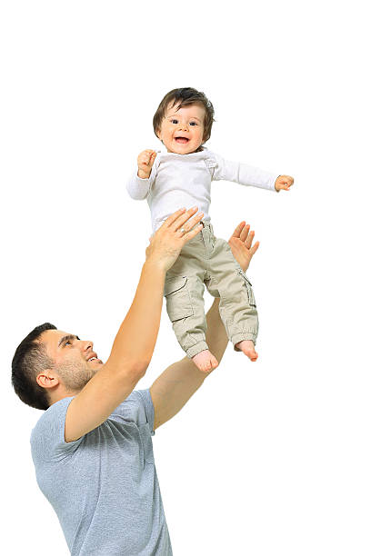 istock Joyful father giving piggyback ride to his son against a 538166894