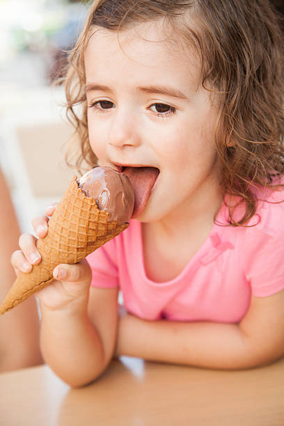 istock girl eating ice cream 538167494