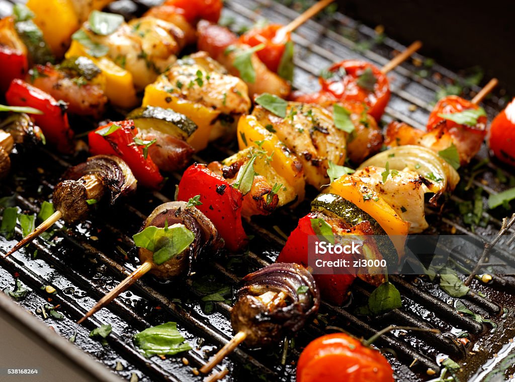 Vegetable and meat skewers in a herb marinade Grilled skewers of vegetatbles and various meat Vegetable Stock Photo