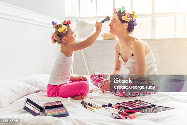 Mom And Daughter Playing Stock Photo - Download Image Now - Adult, Arts Culture and Entertainment, Beauty Product