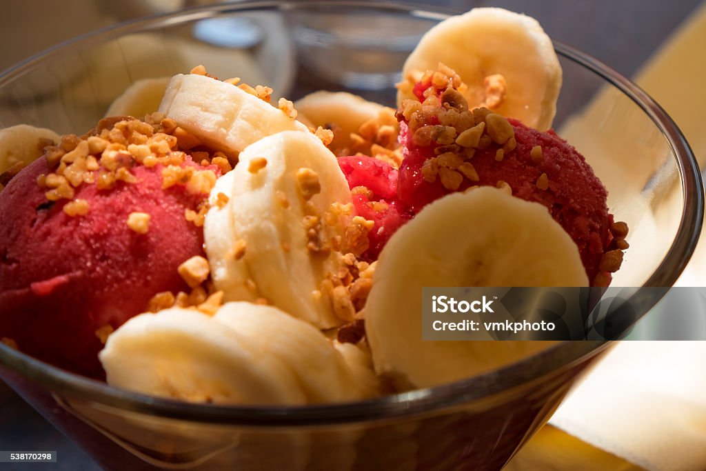 ice cream dessert raspberry ice cream dessert with bananas Banana Stock Photo