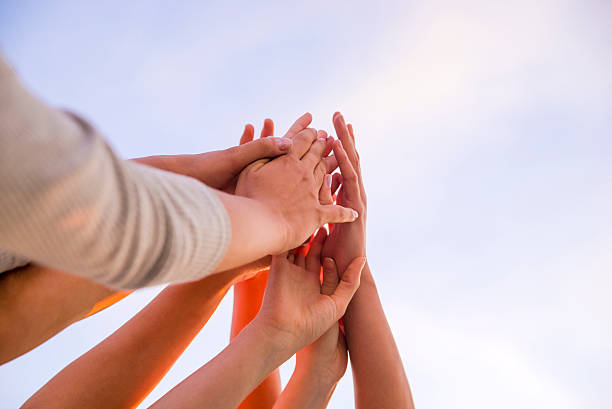 istock Happy friends at the rooftop doing high five 538172746
