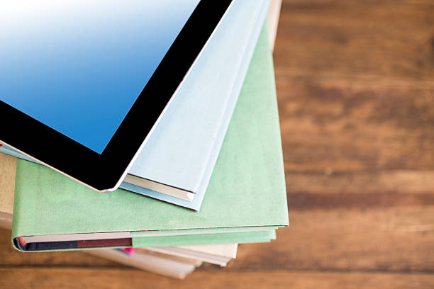 istock Back to school. Education. Textbooks, digital tablet on desk. Chalkboard. 538172750