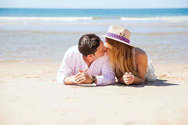 istock Couple kissing at the beach 538174730