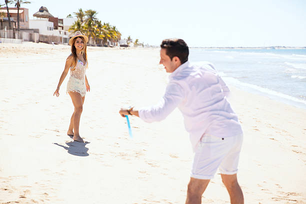 istock Playing with a flying disc at the beach 538175226