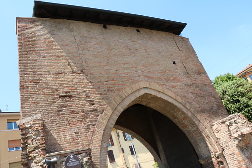 Porta San Vitale under blue sky in Bologna, Italy