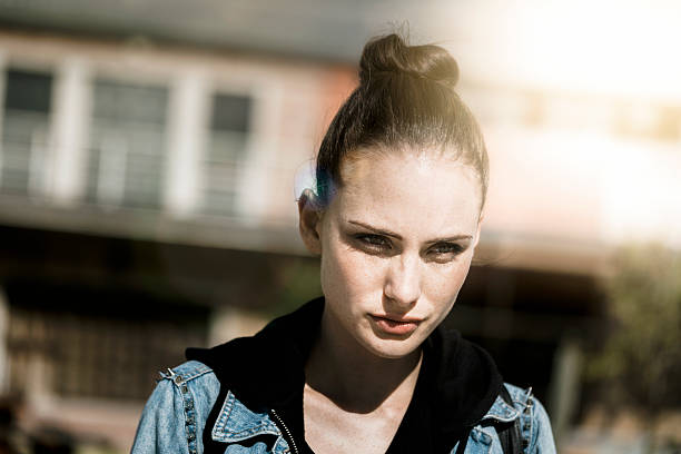 istock Confident young woman looking away outdoors 538177740