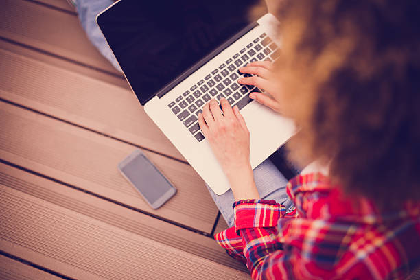 istock Top view of woman typing on laptop 538178264