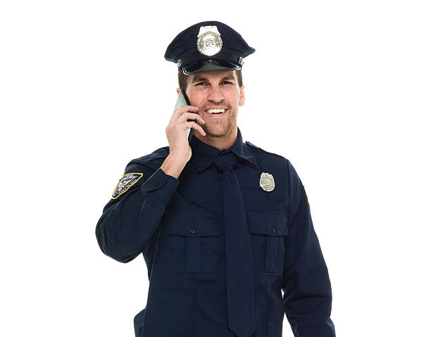 istock Smiling police talking on phone 538180482