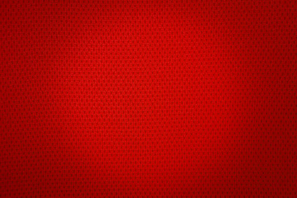 malla de textura de tela roja deportes - jersey fotografías e imágenes de stock