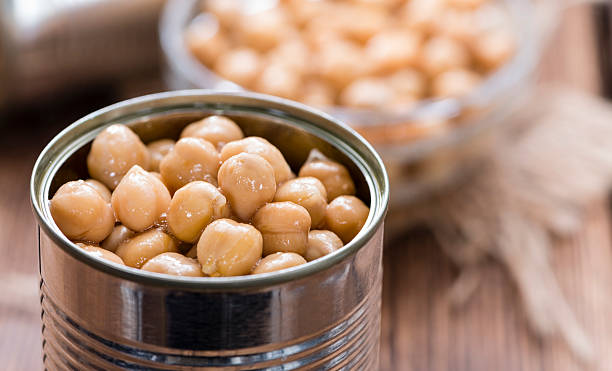 Preserved Chick Peas Portion of preserved Chick Peas (close-up shot) legume family stock pictures, royalty-free photos & images