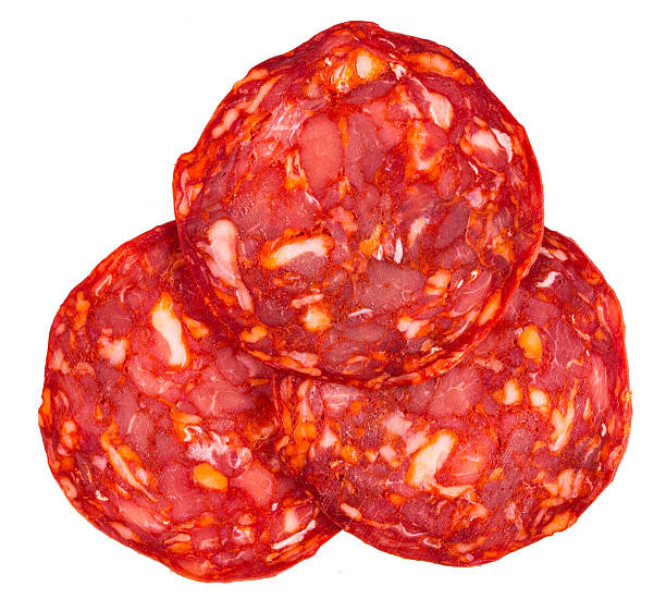 istock Cut Spanish sausage or salami chorizo. Isolated on white 538182001