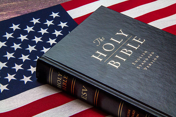 istock Bible with USA flag 538182524