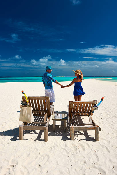 istock Couple in blue on a beach at Maldives 538183097