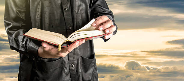 istock Muslim Man holding the Koran 538183490