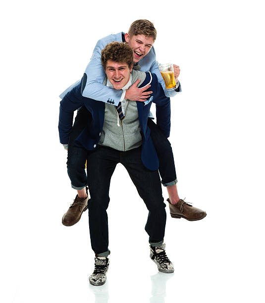 istock Brothers doing piggyback and having drink 538186738