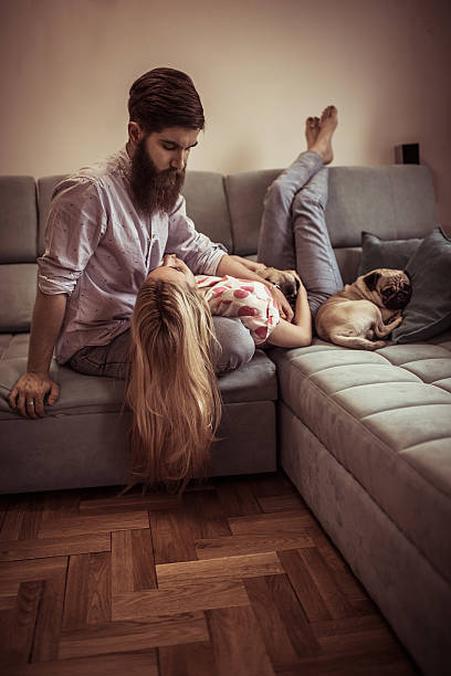 istock Young relaxed couple communicating in the living room. 538190484