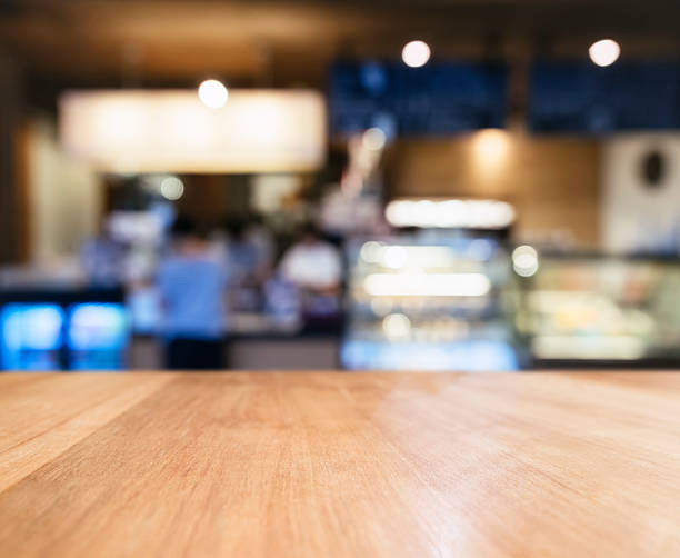 istock Table top Counter with Blurred People Cafe Restaurant Shop 538192884