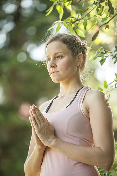 istock Young Woman Practicing Yoga Outdoors 538196042