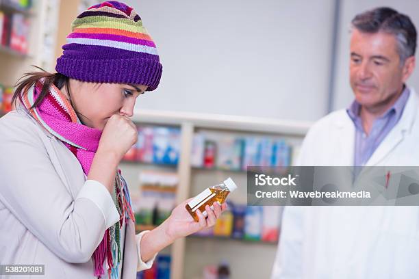 Sick Woman Holding A Box Of Medicine Stock Photo - Download Image Now - 20-24 Years, 20-29 Years, 2015