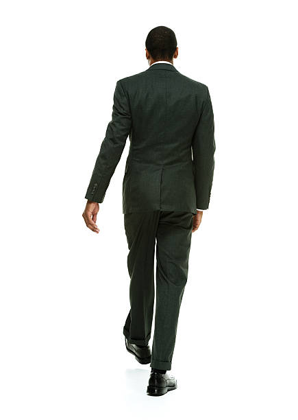 istock Rear view of businessman walking 538203065