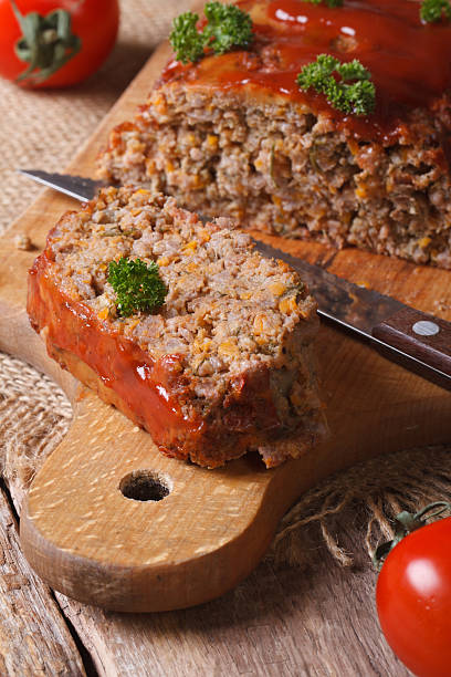 istock meat loaf close-up on a cutting board. Vertical 538204571