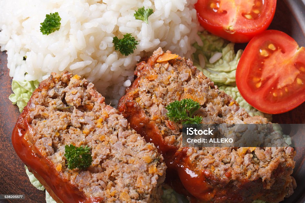 meat loaf with rice and vegetables macro horizontal top view meat loaf with rice and vegetables on a plate macro horizontal view from above 2015 Stock Photo