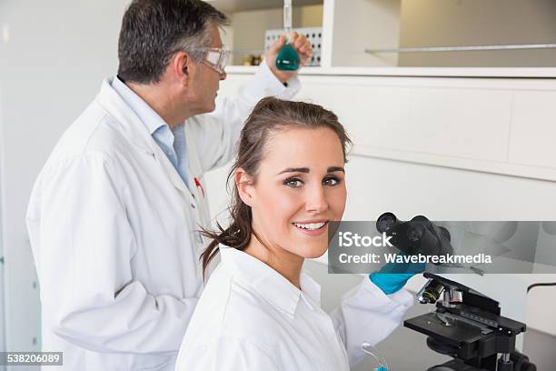 Team Of Scientists At Work Stock Photo - Download Image Now - 20-24 Years, 20-29 Years, 2015