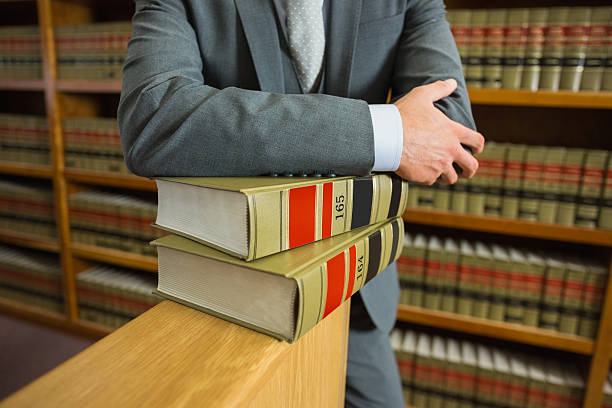 istock Lawyer standing in the law library 538235079