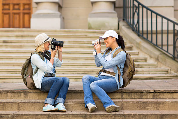 istock tourists photographing each other 538235249