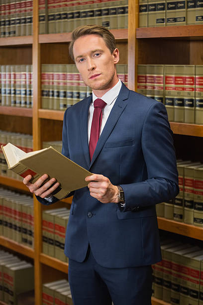 istock Handsome lawyer in the law library 538235839